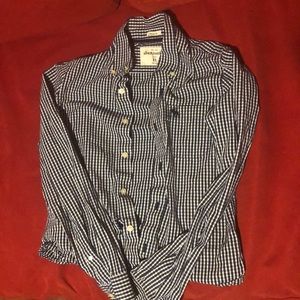 A kids XL muscle buttoned up shirt